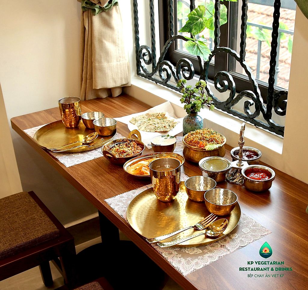 A vegetarian meal with breads and curries at KP